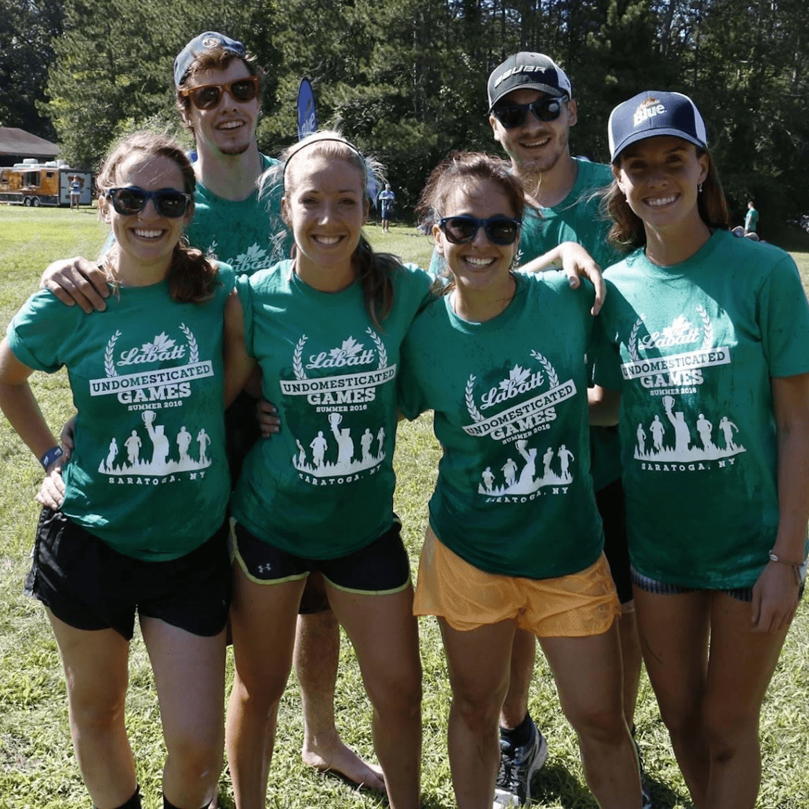 Picture of a group of people wearing sponsored t-shirts
